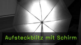 Schirm mit Aufsteckblitz benutzen